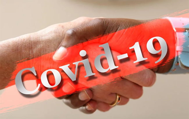 covid coronavirus stretta mani